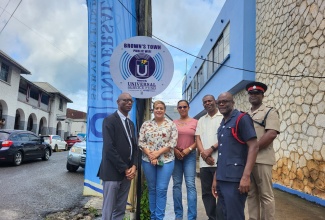 Director of Projects at Universal Service Fund (USF), Jaime Robinson (left), is joined by various stakeholders at the launch of the Connect Ja Public Wi-Fi in Brown’s Town, St. Ann on October 11. From second left are Member of Parliament for St. Ann North Western, Krystal Lee; Community Development Officer, Social Development Commission (SDC), Nicola Bailey; Councillor for the Dry Harbour Division, Carlton Ricketts; Jamaica Constabulary Force (JCF) Inspector of the St. Ann’s Bay Division, Ricardo Beckford, and Acting Assistant Superintendent for the Jamaica Fire Brigade, Camron Barrett.

