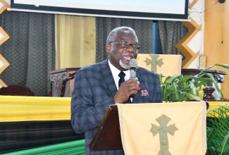 Custos of St. James, Bishop the Hon. Conrad Pitkin, delivers Governor General, His Excellency the Most Hon. Sir Patrick Allen’s Heritage Week message during a church service held at the Holiness Born Again Church of Jesus Christ Apostolic in West Green, St. James on Sunday (Oct. 20).