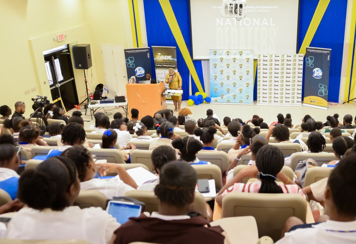 Students attending the media launch for National Debaters’ Week 2024 at the University of Technology (UTech) campus in St. Andrew on Tuesday (October 8), listen attentively to a presentation during the event.

