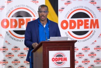 Chief Fiscal Economist, Ministry of Finance and the Public Service, Terron Francis, addresses a townhall on Jamaica’s Comprehensive Disaster Risk Management Policy at the Girl Guides Association of Jamaica headquarters in St. Andrew on Thursday (October 24).

