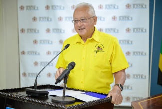 Justice Minister, Hon. Delroy Chuck, addresses the Hanover Justice Centre contract-signing ceremony on Friday (October 4), at the Ministry