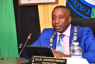 Mayor of Kingston, Councillor Andrew Swaby, addresses the monthly meeting of the Kingston and St Andrew Municipal Corporation (KSAMC) on October 8 at the entity’s downtown Kingston offices.

