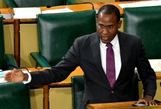 Minister of Finance and the Public Service, Dr. the Hon. Nigel Clarke, addresses the House of Representatives on October 15.

