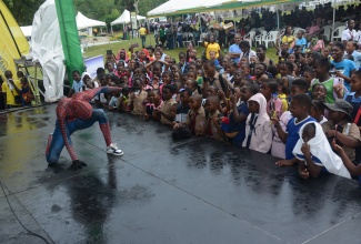 Students enjoy a performance by “spiderman” during the Seville Heritage Expo 2024 at Seville Heritage Park in St. Ann’s Bay, St. Ann on October 16.