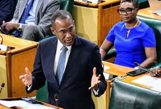 Minister of Finance and the Public Service, Dr. the Hon. Nigel Clarke, makes a statement in the House of Representatives on October 1.