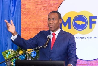 Minister of Finance and the Public Service, Dr. the Hon. Nigel Clarke, delivers remarks during the launch of the Financial Sector Adjustment Company (FINSAC) Archives at The Jamaica Pegasus hotel in New Kingston on Thursday (October 17).

