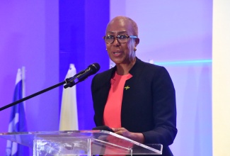 Minister of Education and Youth, Hon. Fayval Williams, addresses the opening of the World Federation of Colleges and Polytechnics (WFCP) World Congress at the Hilton Rose Hall Resort and Spa in Montego Bay, St. James, on September 25.