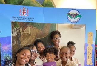 Students of Herbert Morrison Technical High School in Montego Bay, St. James, celebrate International Day of Rural Women held in 2023 at Moneague College in St Ann.

