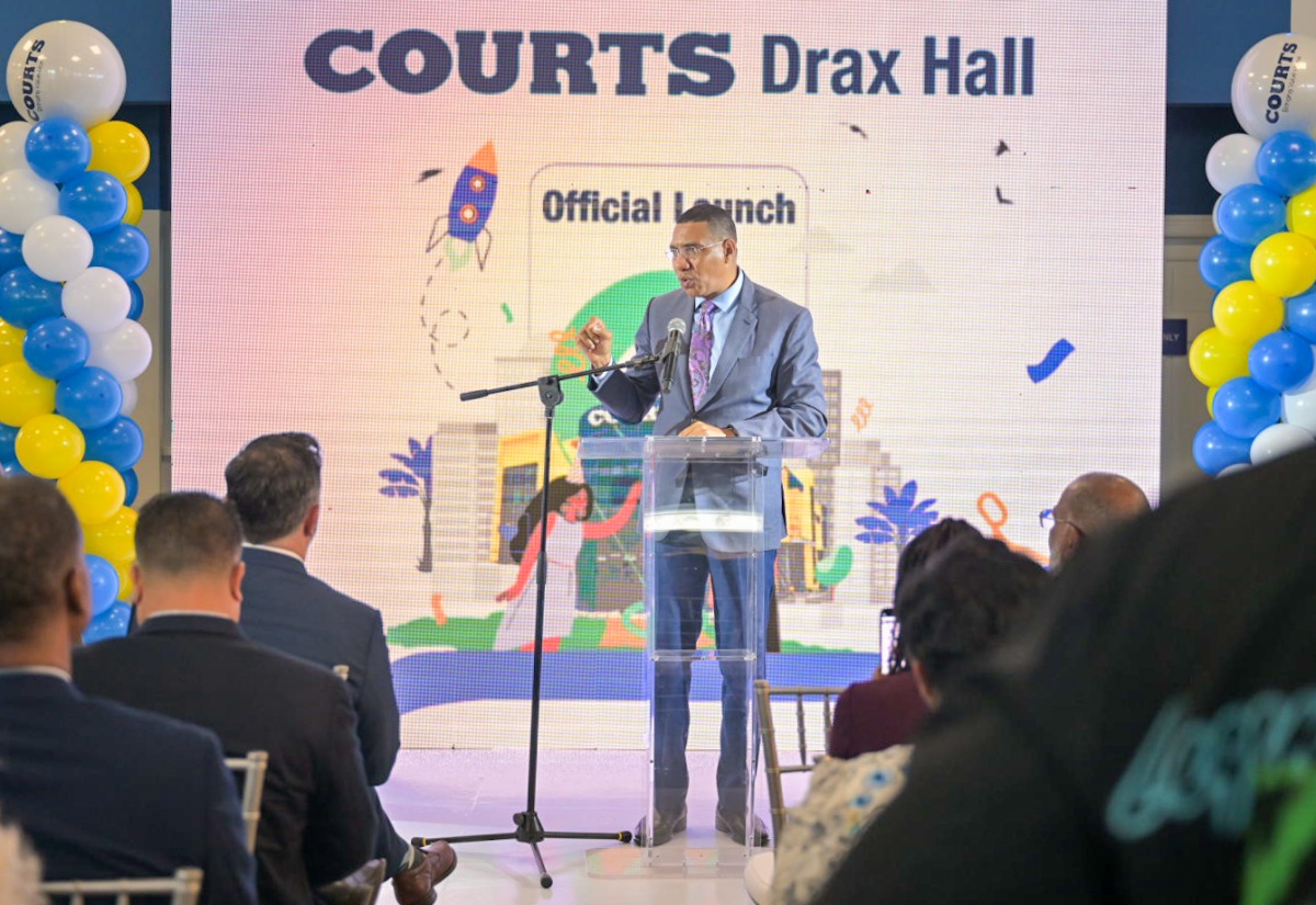 Prime Minister, Dr. the Most Hon. Andrew Holness, provides details about two major road projects for St. Ann, during the opening of the new Courts location in Drax Hall in the parish on October 10. 
