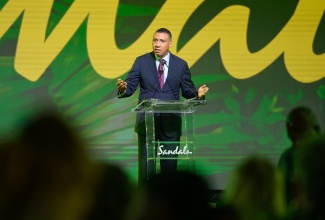 Prime Minister, Dr. the Most Hon. Andrew Holness, addresses Sandals Resort International’s Mega Showcase,  at the Montego Bay Convention Centre in St. James, on Wednesday (October 16).

