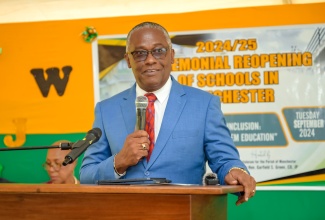Custos of Manchester, Garfield Green, addresses a function to launch the 2024/05 academic year in the parish and unveil a Science, Technology, Engineering and Mathematics (STEM) Education Programme, held recently at the Winston Jones High School.