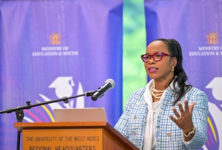 Permanent Secretary in the Ministry of Education and Youth, Dr. Kasan Troupe, addresses the recent Education Transformation Oversight Committee (ETOC) press conference at the University of the West Indies (UWI) Regional Headquarters in St. Andrew.

