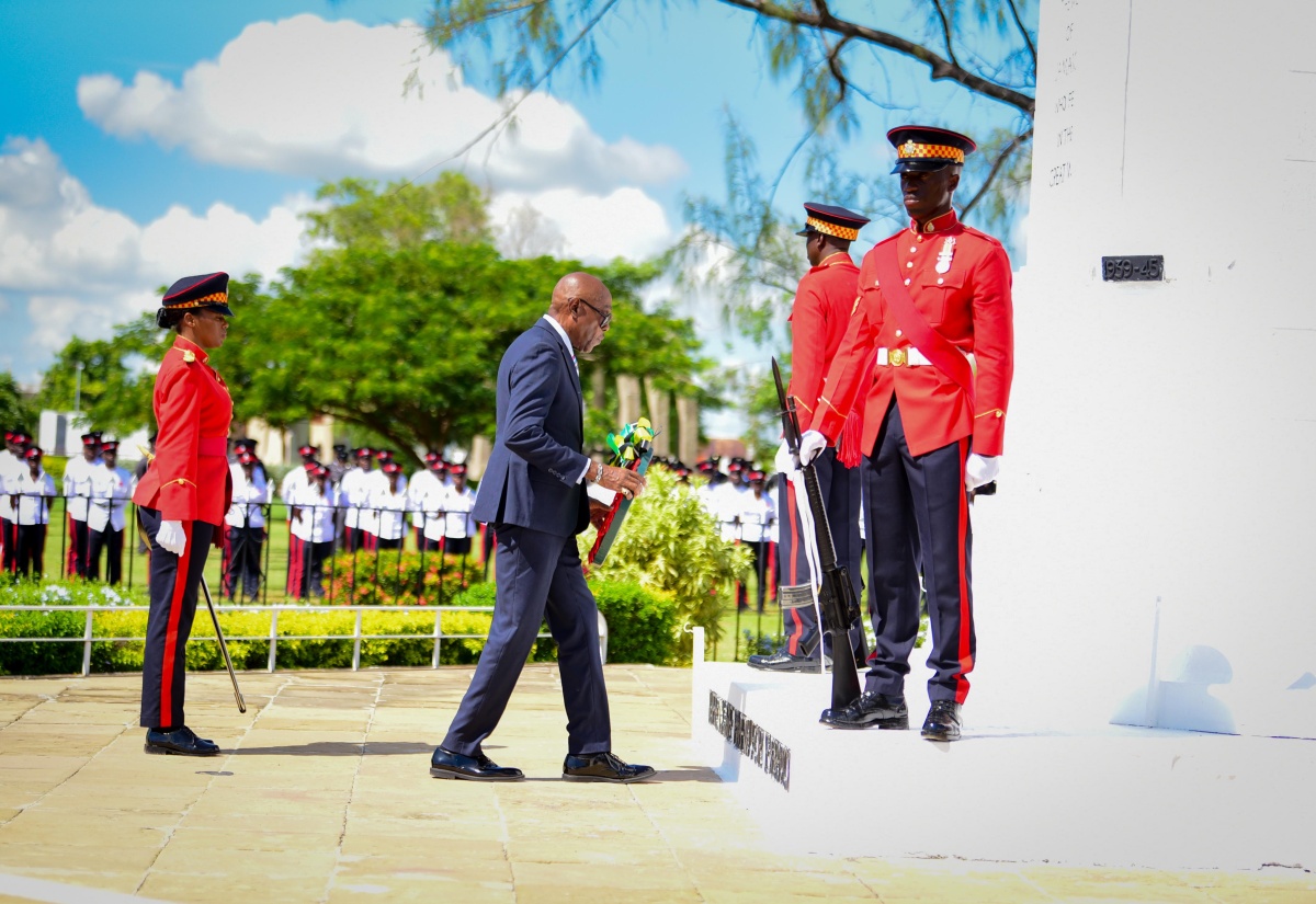 Custos Rotulorum for St. Andrew, Hon. Ian Forbes, representing Governor-General, His Excellency the Most Hon. Sir Patrick Allen, lays a wreath at the Cenotaph honouring those who gave their lives in the two great wars. The occasion was the annual Remembrance Day Parade on Monday (November 11) at National Heroes Park in Kingston. 
