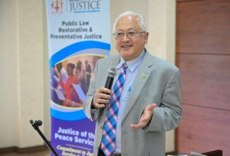 Minister of Justice, Hon. Delroy Chuck, delivers the keynote address during Thursday’s (November 14) Justice of the Peace (JP) Sensitisation Session at the Casa Maria Hotel in St. Mary. This engagement formed part of the Ministry’s ongoing efforts to strengthen the capacity of JPs and sensitise JP Association executive members about the policies and procedures that will broaden the scope of the services they deliver.

