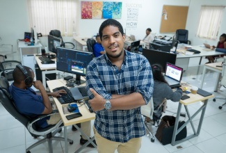 Founder and Chief Executive Officer (CEO) of Adtelligent, Craig Powe, stands in the company's corporate office at 4 Sylvan Avenue, Kingston 5.

