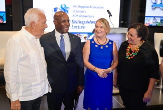 Minister of Industry, Investment and Commerce, Senator the Hon. Aubyn Hill (second left), with (from left): Executive Chairman, Jamaica Fruit and Shipping Company, Charles Johnston; European Union (EU) Ambassador to Jamaica, Her Excellency Dr. Erja Askola, and Shipping Association of Jamaica (SAJ) President, Corah Ann Robertson-Sylvester, during the SAJ’s 85th Anniversary Distinguished Lecture at the AC Hotel by Marriott Kingston on Friday (November 1).