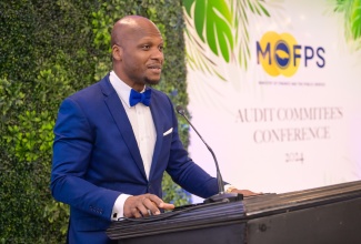 Permanent Secretary in the Ministry of Legal and Constitutional Affairs, Wayne Robertson, delivers remarks during the annual Audit Committees’ Conference at The Summit in Kingston on Thursday (November 7).

