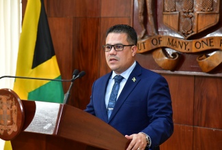 Minister without Portfolio in the Ministry of Economic Growth and Job Creation, Hon. Matthew Samuda, speaks at a post-Cabinet press briefing, held at Jamaica House on November 27.

