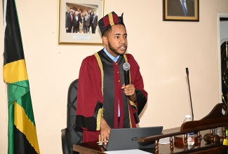 Junior Mayor of Black River, Kishnan Bennett, addresses the St. Elizabeth Municipal Corporation’s Junior Council 2024 meeting, held in the parish capital on Tuesday (November 26). The meeting formed part of activities marking Local Government and Community Month 2024, being observed throughout November under the theme ‘Local Government at Work: Facing the Future Together’.

