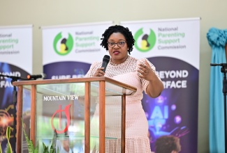 Chief Executive Officer of the National Parenting Support Commission (NPSC), Kaysia Kerr, addresses the National Parent Month church service held on Sunday (November 3) at the Mountain View New Testament Church of God in Kingston. The theme for Parent Month is ‘Surf Beyond the Surface’.

