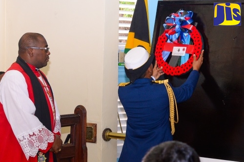Chief of Defence Staff, Vice Admiral (VAdm) Antonette Wemyss-Gorman (right), lays a wreath at the Jamaica Defence Force’s Remembrance Day Church Service held at the Garrison Church of the Ascencion, Up Park Camp, Kingston today (November 10). Looking on is Major (Rt Rev'd) Dr. Damion Ffriend