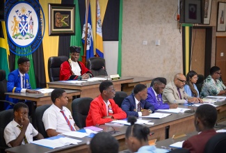 Members of the new cohort of the Kingston and St. Andrew Municipal Corporation (KSAMC) Junior Council participate in Friday’s (November 15) mock sitting at the KSAMC’s offices in downtown Kingston. 