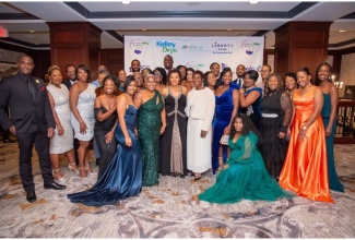 Jamaica’s Ambassador to the United States, Her Excellency Audrey Marks (front row, fourth left), shares a moment with members of the Jamaican American Connection, during the organisation’s annual trailblazer and scholarship awards gala on November 2 at the Omni New Haven Hotel in Connecticut.

