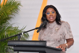 Cabinet Secretary, Audrey Sewell, addresses the inaugural Integrated Results Based Management (IRBM) Excellence Awards Ceremony at the Jamaica Pegasus Hotel in New Kingston on Wednesday (November 6).

