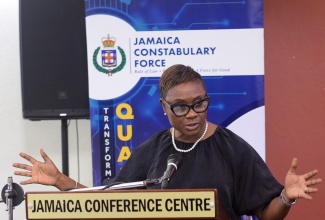 Minister of State in the Ministry of National Security,  Hon. Juliet Cuthbert Flynn, addresses the 37th National Neighbourhood Watch Conference at the Jamaica Conference Centre in downtown Kingston on Thursday (November 7).

