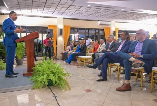 Prime Minister,  Dr. the Most Hon. Andrew Holness, addresses the launch of ASPIRE Jamaica, the Government’s new policy framework for inclusive growth, at the Office of the Prime Minister on November 19.