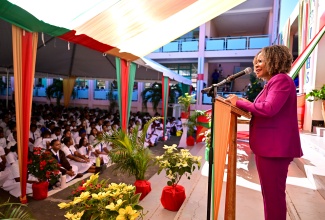 Minister of Education, Skills, Youth and Information, Senator Dr. the Hon. Dana Morris Dixon, delivers the keynote address during Immaculate Conception High School’s prize giving ceremony on Wednesday (December 18).