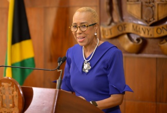 Minister of Finance and the Public Service, Hon. Fayval Williams addresses Wednesday’s (Dec. 11) post Cabinet press briefing at Jamaica House.

