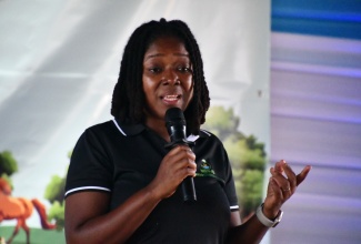 Director, Corporate Communications and Public Relations, Ministry of Economic Growth and Job Creation (MEGJC), Dannie Clarke, addresses the EcoChampions School Tour at the Negril/Green Island Local Planning Authority (NEGALPA) in Westmoreland, recently. 