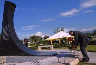 Leader of the Opposition, Mark Golding, places a wreath at the shrine of former Prime Minister, the Most Hon. Michael Manley, during a floral tribute held at National Heroes Park in downtown Kingston on Tuesday (December 10) to commemorate the 100th anniversary of Mr. Manley’s birth. Mr. Manley, who was Jamaica’s fourth Prime Minister, served from 1972 to 1980 and 1989 to 1992. He was born on December 10, 1924 and died on March 6, 1997.
