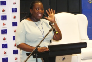 Executive Director of Jamaica AIDS Support for Life (JASL), Kandasi Walton-Levermore, addresses a recent forum held at The Jamaica Pegasus hotel in New Kingston.