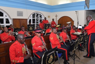 The Jamaica Defence Force (JDF) military band plays a musical item during the JDF’s annual carol service at the Garrison Church of The Ascension, Up Park Camp, Kingston, on Tuesday (December 3). The Carol Service is a cherished tradition within the JDF that symbolises community spirit, unity and the heart of the Christmas season. 

