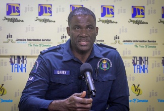 Caption: A member of the Jamaica Constabulary Force’s Public Safety and Traffic Enforcement Branch (PSTEB),  Superintendent Lloyd Darby, speaks at a Jamaica Information Service (JIS) Think Tank, on December 16.

