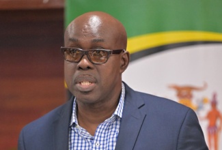 Head of the Praedial Larceny Prevention Coordination Unit, Superintendent Oral Pascoe, addresses a press conference held at the Ministry of Agriculture, Fisheries and Mining, Hope Gardens,  in Kingston on December 18.