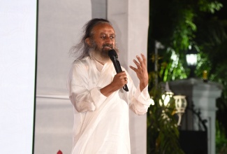 Global humanitarian and spiritual leader Gurudev Sri Sri Ravi Shankar, speaks at the Business and Ethics event held on Friday (December 13) at India House, 2 East King’s House Road, Kingston.

