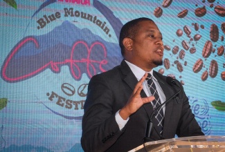 Minister of Agriculture, Fisheries and Mining, Hon. Floyd Green, addresses the launch of the Blue Mountain Coffee Festival on Thursday (January 9) on the lawns of Devon House in Kingston.

