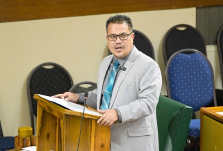 Minister without Portfolio in the Ministry of Economic Growth and Job Creation, Hon. Matthew Samuda, addresses the House of Representatives on Tuesday (January 14).

