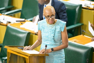 Minister of Finance and the Public Service, Hon. Fayval Williams, addresses the House of Representatives on January 14.

