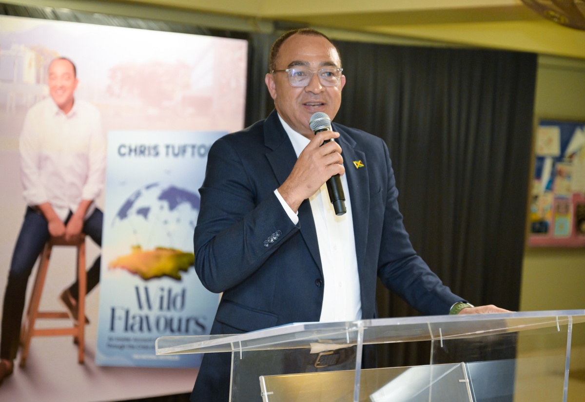 Minister of Health and Wellness, Dr. the Hon. Christopher Tufton, addresses the official launch of his latest book, ‘Wild Flavours’, at the Undercroft, University of the West Indies, Mona, St. Andrew, on January 21.


