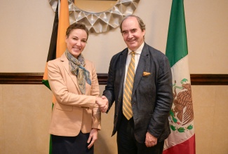 Minister of Foreign Affairs and Foreign Trade, Senator the Hon. Kamina Johnson Smith (left), greets Mexican Ambassador to Jamaica, His Excellency Juan González Mijares, during the Ambassador’s farewell call and luncheon at The Jamaica Pegasus hotel in New Kingston on Tuesday (January 28). Ambassador Mijares’ tour of duty ends after serving in Jamaica since 2018