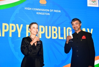 Minister of Foreign Affairs and Foreign Trade, Senator the Hon. Kamina Johnson Smith and the High Commissioner of India to Jamaica, His Excellency Mayank Joshi, raise their glasses in a toast at a reception to commemorate the 76th India Republic Day, held on Sunday (January 26) at India House, 2 East King’s House Road, in Kingston.