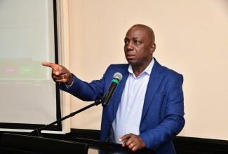 Executive Director of the National Solid Waste Management Authority (NSWMA), Audley Gordon, addresses the Authority’s special operations meeting on Monday (January 6) at the Courtleigh Hotel in Kingston.

