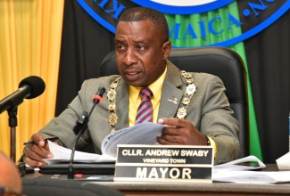 Mayor of Kingston, Councillor Andrew Swaby, addressing Tuesday’s (January 14) meeting of the Kingston and St. Andrew Municipal Corporation (KSAMC) held at the Corporation’s offices in downtown Kingston.

