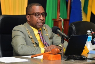 Mayor of Kingston, Councillor Andrew Swaby, addressing a meeting of the Kingston and St. Andrew Municipal Corporation (KSAMC) held at the Corporation’s offices in downtown Kingston on January 14.

