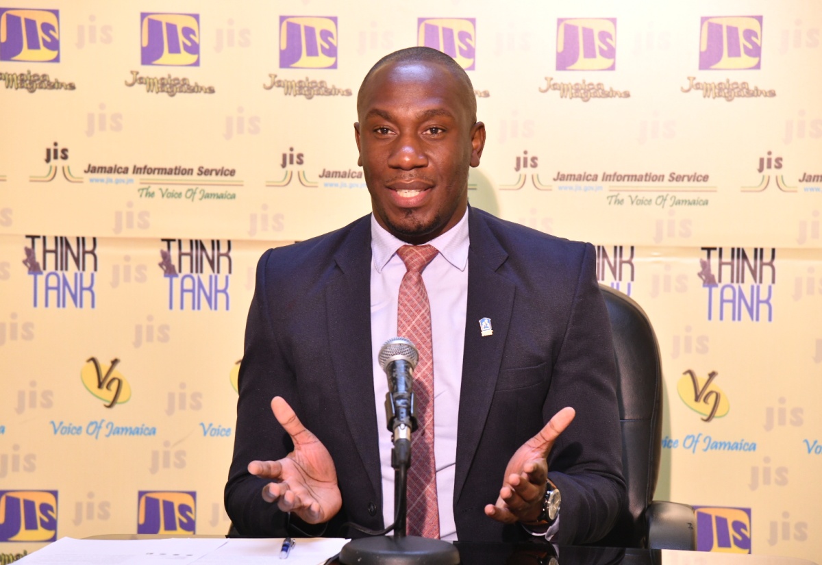 Assistant General Manager for Corporate Communications and Public Affairs at the National Housing Trust (NHT), Dwayne Berbick, addresses a recent JIS Think Tank