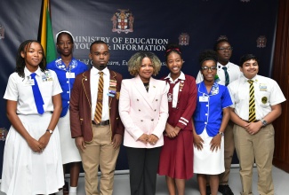 Minister of Education, Skills, Youth and Information, Senator Dr. the Hon. Dana Morris Dixon (fourth left), shares a photo opportunity with members of the National Secondary Students’ Council (NSSC) and the Jamaica Prefects’ Association (JPA), during a courtesy call at the Ministry’s Heroes Circle offices in Kingston on Tuesday (January 21). The student leaders (from left) are NSSC Region One Vice President, Jhonelle Knight; NSSC National Treasurer, Chelsea Moulton; JPA Region Five Vice President, Jovanni McLaughlin; NSSC President, Laurel Williams; JPA President, Rheanna Robinson; JPA National General Secretary, Elijah McDonald; and NSSC National General Secretary, Nikhil Lalwani. 